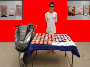 စိုင်းဦးမောင် အား သိမ်းဆည်းရမိသည့် စိတ်ပြောင်းဆေးဝါး Happy Water များနှင့်အတူ တွေ့ရစဉ်။