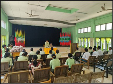 ရန်ကုန်တိုင်းဒေသကြီး၊ သန်လျင်ခရိုင်၊ ခရမ်းမြို့နယ်အထွေထွေအုပ်ချုပ်ရေးဦးစီးဌာန၊ ဗြဟ္မစိုရ်ခန်းမ၌  မြို့နယ်စီမံအုပ်ချုပ်ရေးအဖွဲ့ဥက္ကဋ္ဌ ဦးဆောင်၍ ဝန်ထမ်းသက်သာချောင်ချိရေးအတွက်  အခြေခံစားသောက်ကုန်ပစ္စည်းများ  ထောက်ပံ့ပေးအပ်မှု မှတ်တမ်းဓာတ်ပုံ။
