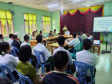 မွန်ပြည်နယ်၊ ကျိုက်ထိုခရိုင် အထွေထွေအုပ်ချုပ်ရေးဦးစီးဌာန၌ တက္ကသိုလ်ဝင်စာမေးပွဲ အောင်မြင်စွာ ကျင်းပနိုင်ရေးအတွက် လုပ်ငန်းညှိနှိုင်း အစည်းအဝေး   ပြုလုပ်မှု မှတ်တမ်းဓာတ်ပုံ။